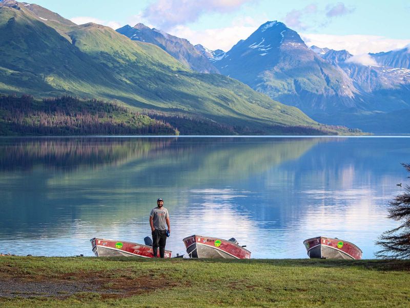 Boats lined up on the shore of Chelatna Lake 